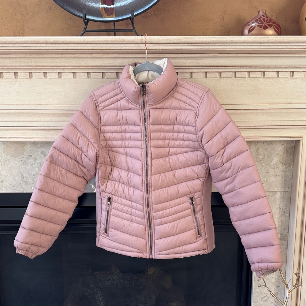 Blush, pink reversible down jacket can be cream as well.